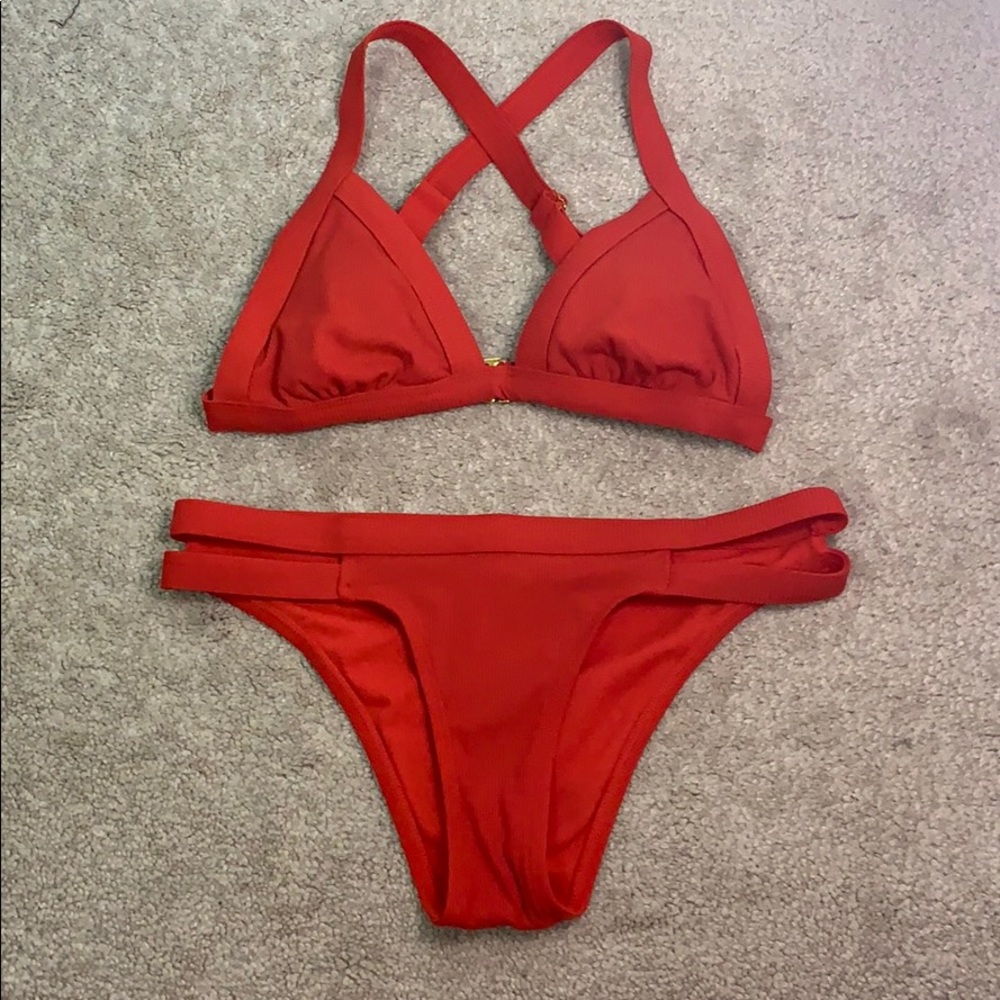 Super cute red bathing suit.